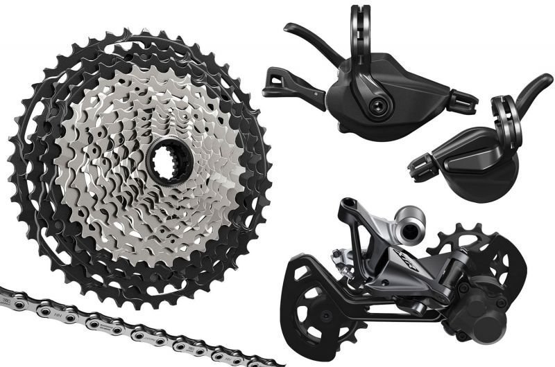 Shimano_XTR-M9100-2x12-fach-Upgrade-Kit-10-45-Schelle-ohne-Umwerfer_20067303_800x800-00.jpg Shimano XTR M9100 2x12-fach Upgrade-Kit 10-45 Schelle – Bild 1